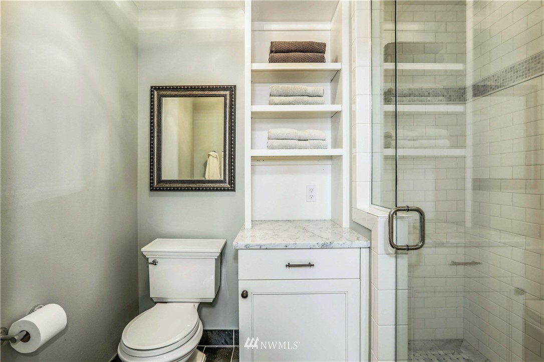 17124 Southeast 100th Street Renton, WA 98059 - Photo 32 of 40 a bathroom with a toilet and a shower