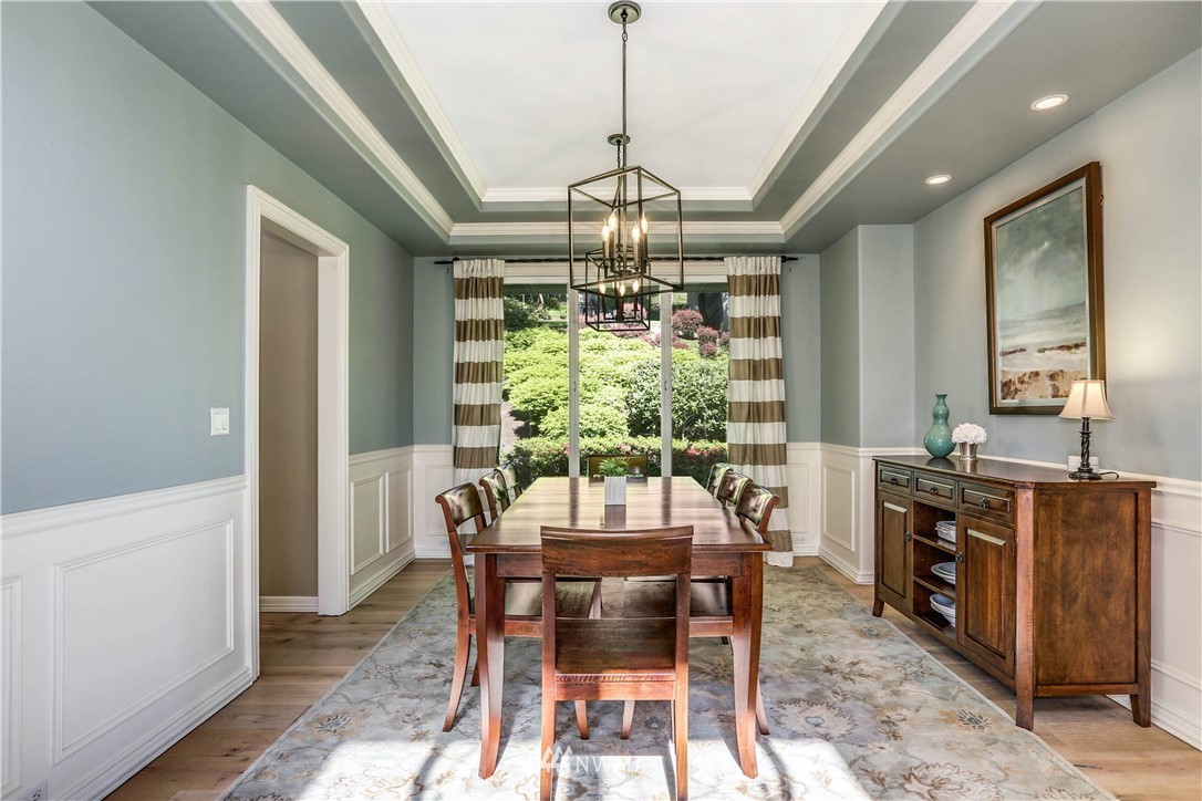 17124 Southeast 100th Street Renton, WA 98059 - Photo 7 of 40 a view of a dining room with furniture window and outside view