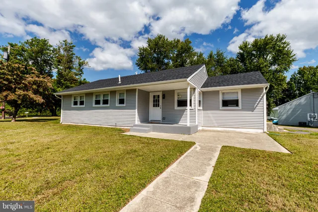 a view of a house with swimming pool