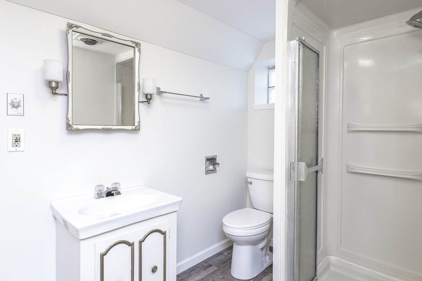 3210 Madison Avenue Brookfield, IL 60513 - Photo 20 of 27 a white toilet sitting next to a bathroom sink