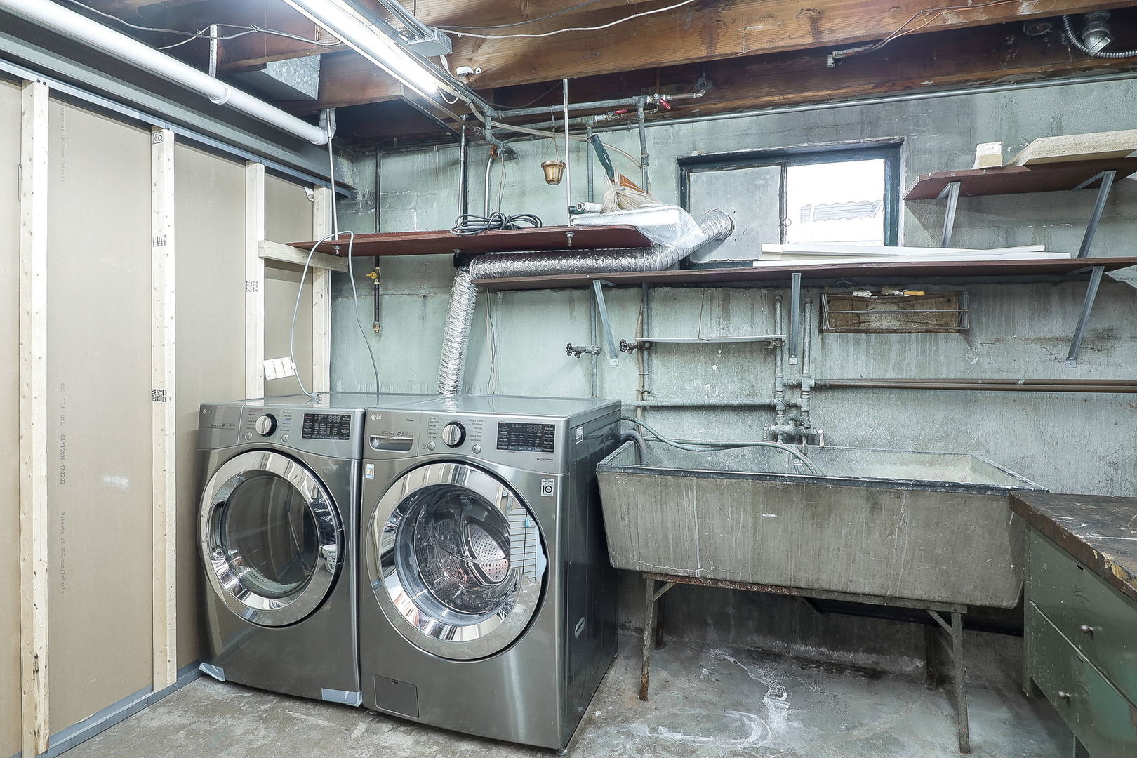 3210 Madison Avenue Brookfield, IL 60513 - Photo 21 of 27 a utility room with a washer and dryer