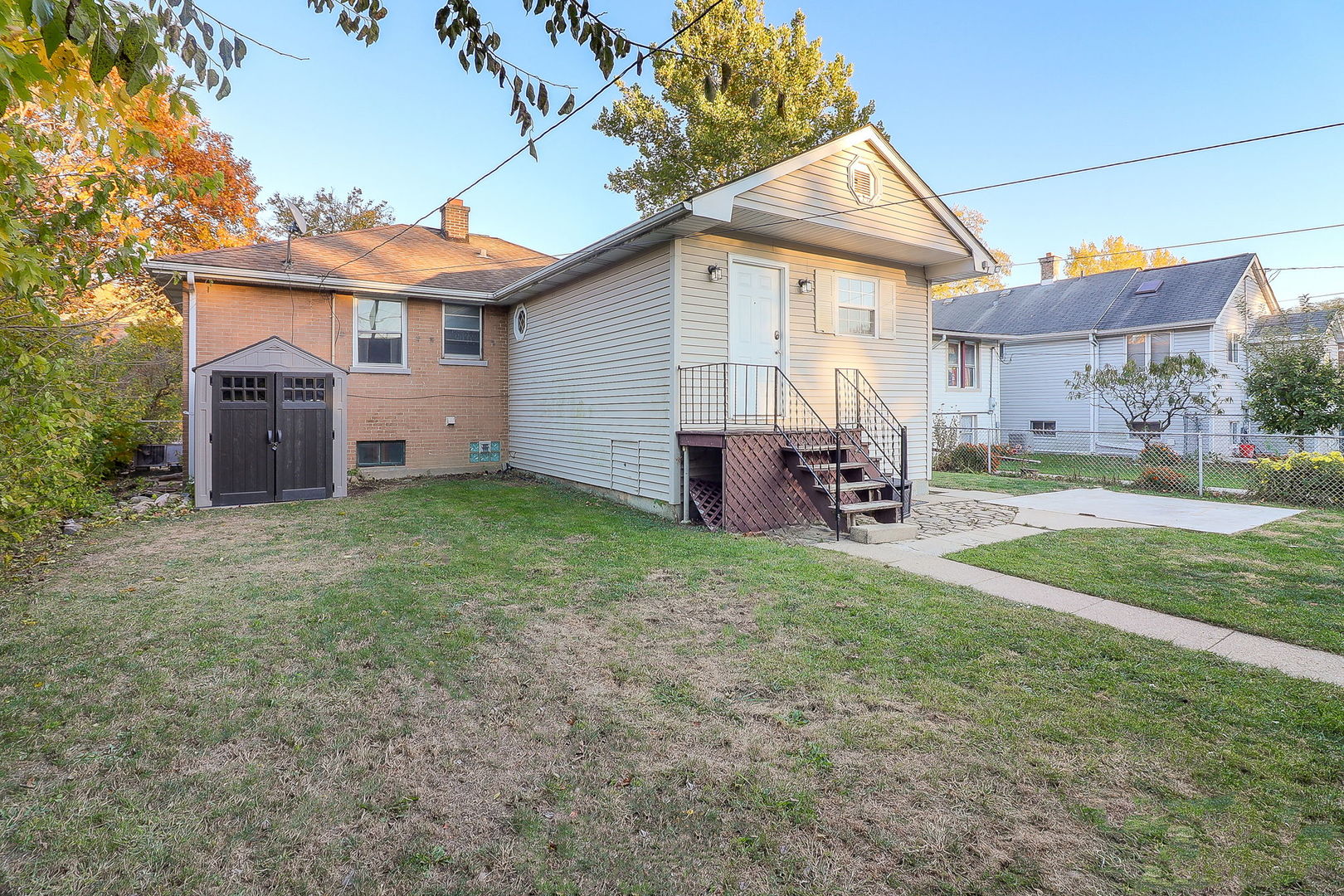 3210 Madison Avenue Brookfield, IL 60513 - Photo 25 of 27 a view of a house with backyard and a tree