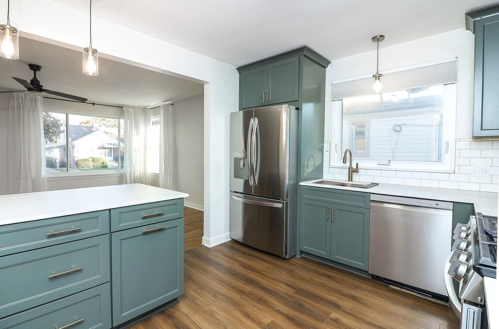 3210 Madison Avenue Brookfield, IL 60513 - Photo 8 of 27 a kitchen with kitchen island granite countertop appliances cabinets and a sink