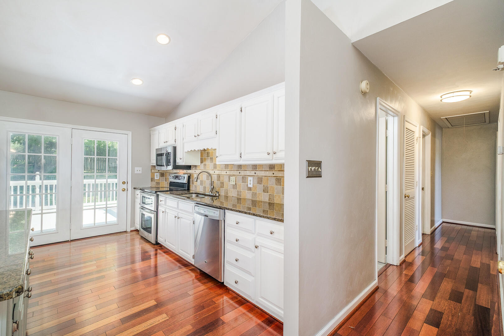 5443 Setter Road Roanoke, VA 24012 - Photo 11 of 42 a kitchen with stainless steel appliances granite countertop a refrigerator and a stove top oven