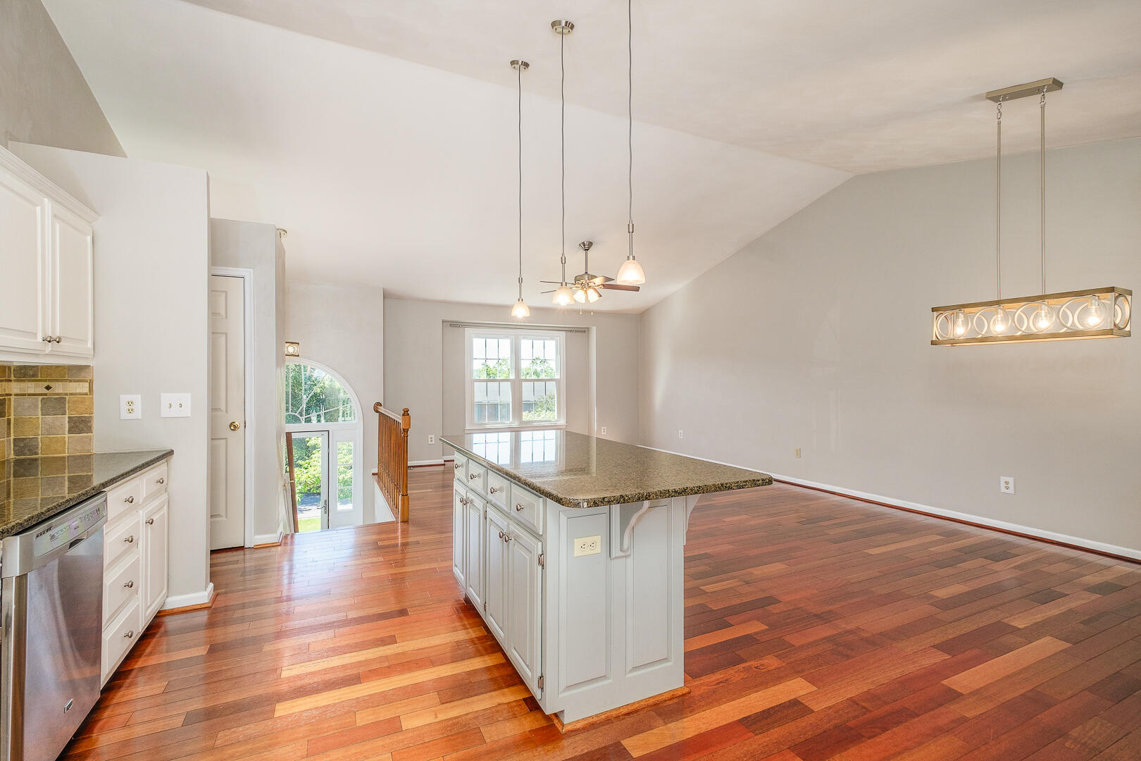5443 Setter Road Roanoke, VA 24012 - Photo 13 of 42 a open kitchen with stainless steel appliances granite countertop a stove and a wooden floors