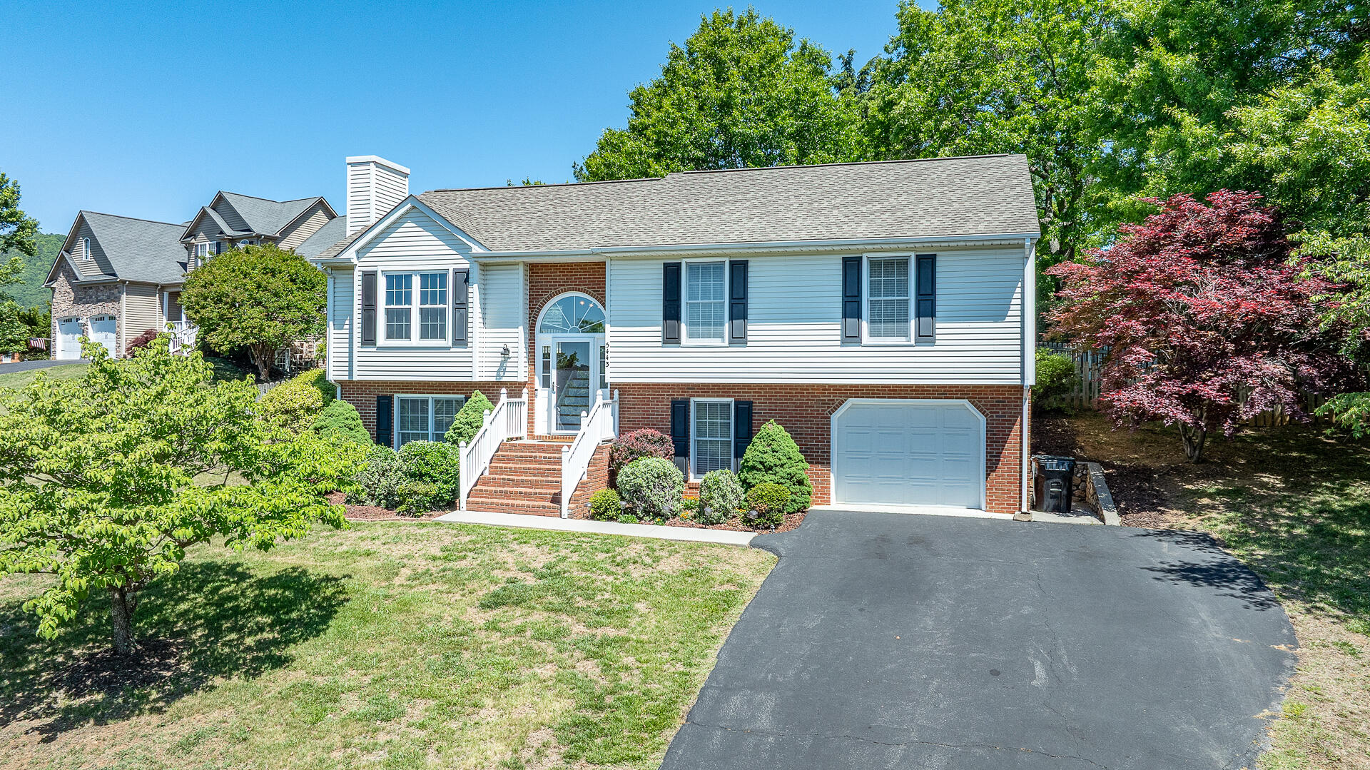 5443 Setter Road Roanoke, VA 24012 - Photo 5 of 42 front view of a house with a yard