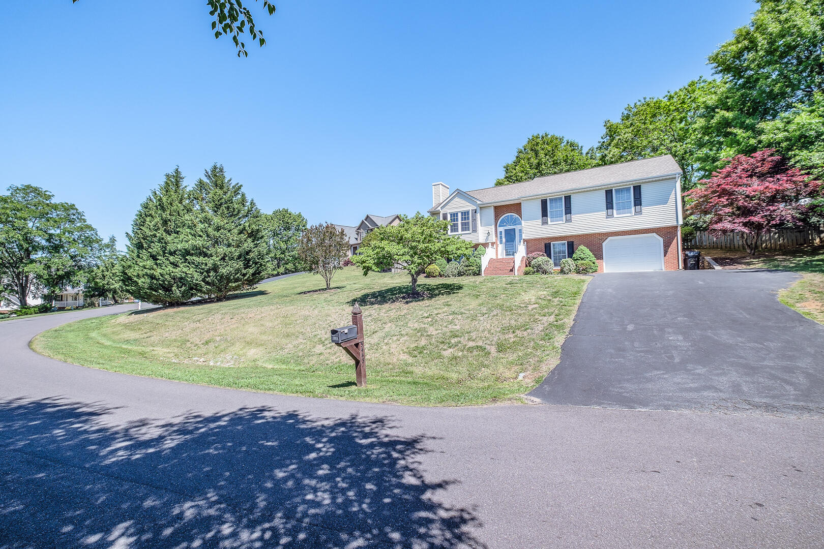 5443 Setter Road Roanoke, VA 24012 - Photo 6 of 42 a view of a house with a yard