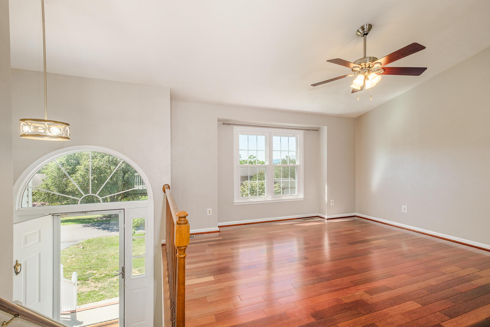 5443 Setter Road Roanoke, VA 24012 - Photo 7 of 42 a view of empty room with wooden floor and fan