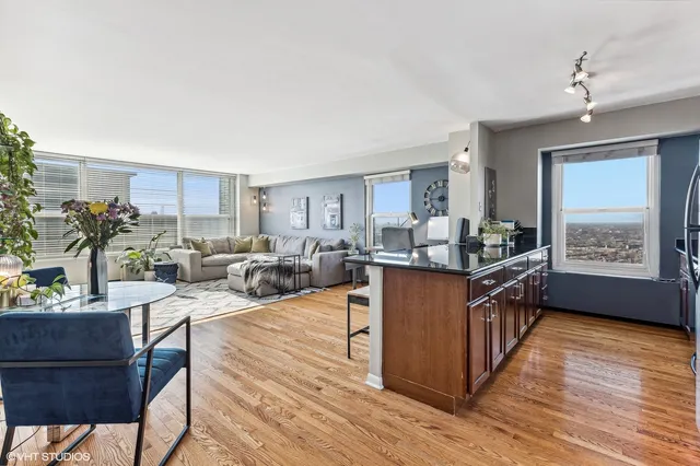a kitchen with refrigerator and stove