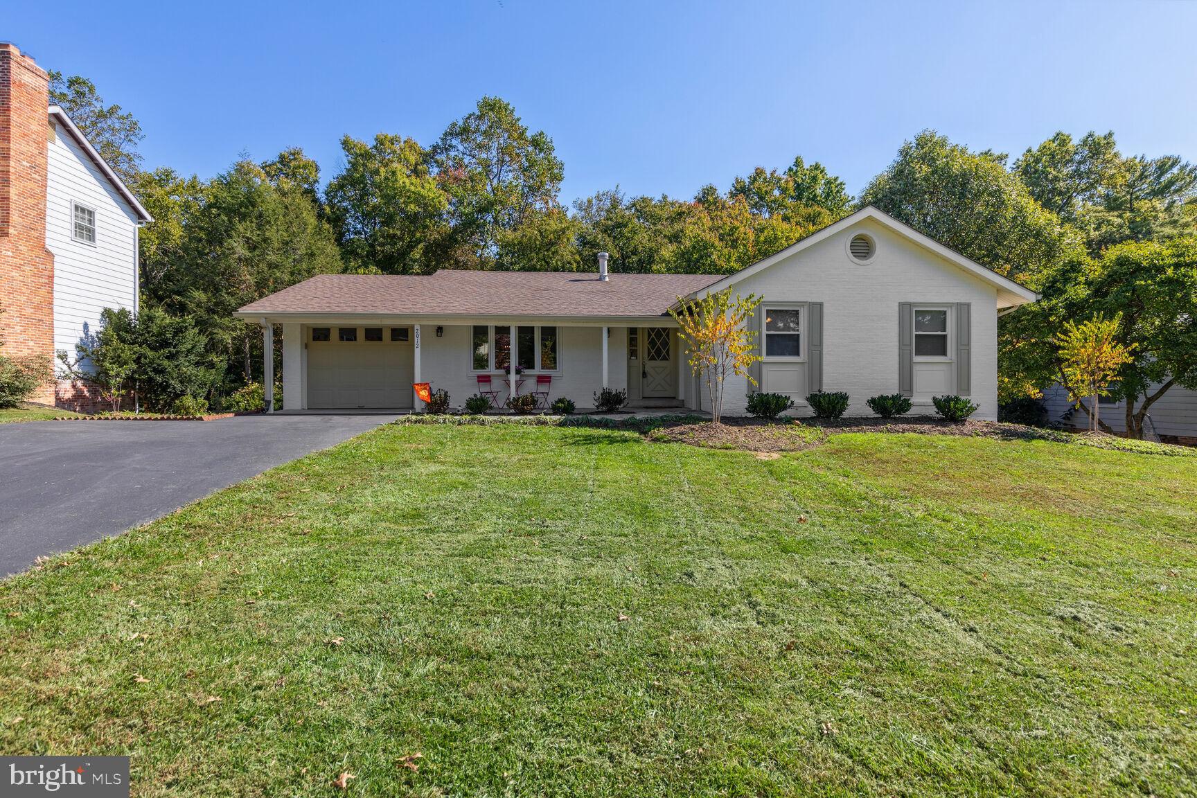 Front of the home, large parking space