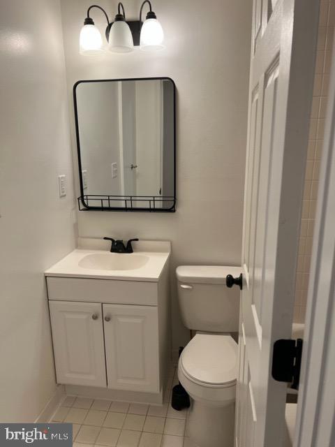 17207 Manning Drive Accokeek, MD 20607 - Photo 15 of 18 a bathroom with a toilet sink and mirror