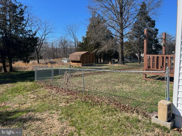 17207 Manning Drive Accokeek, MD 20607 - Photo 17 of 18 a backyard of a house with lots of green space