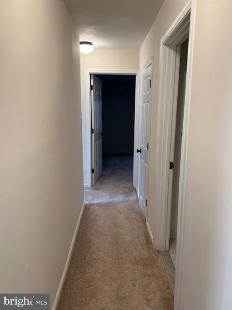 17207 Manning Drive Accokeek, MD 20607 - Photo 8 of 18 a view of a hallway with a hallway