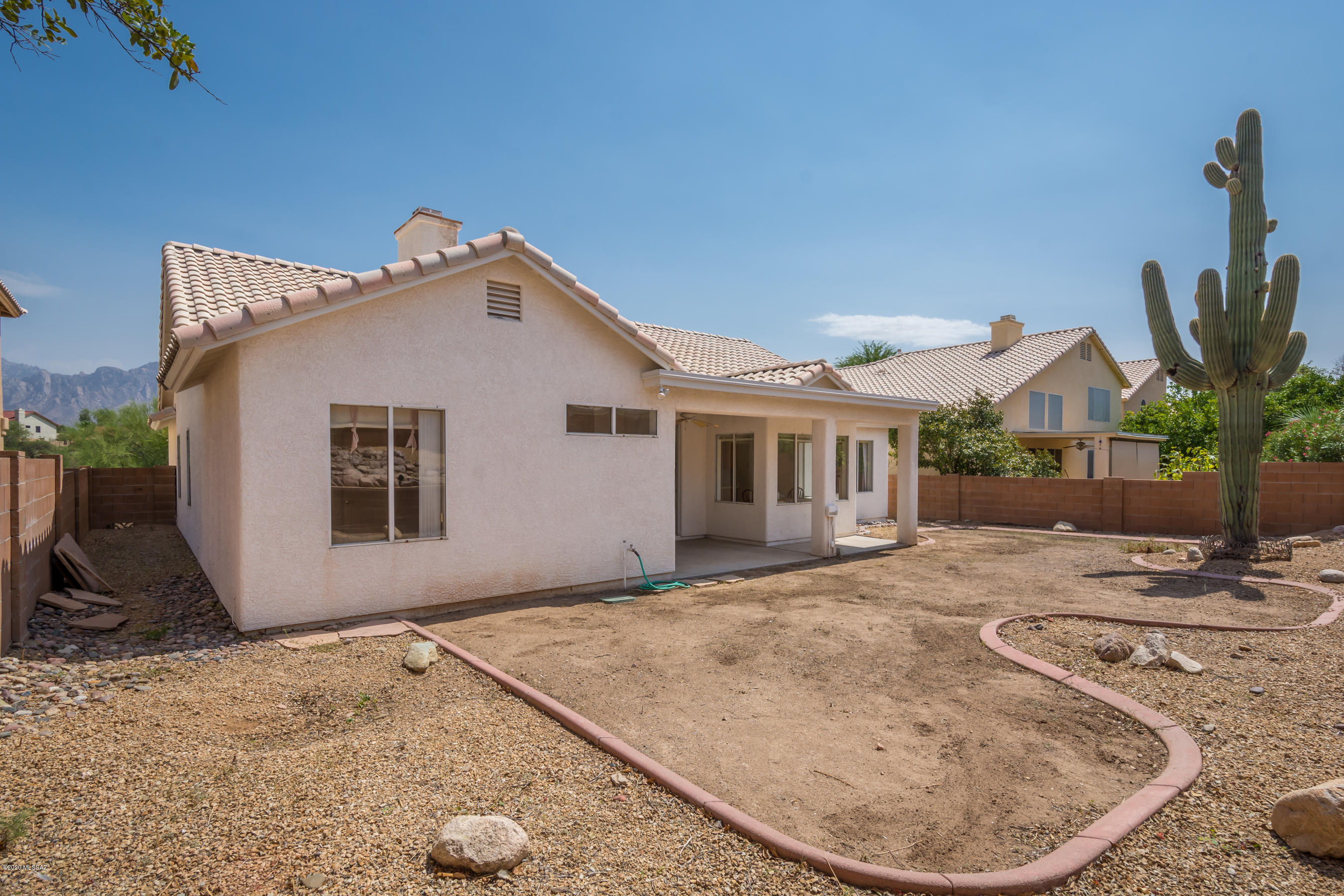 11341 Silver Pheasant Loop Oro Valley, AZ 85737 - Photo 22 of 41 a view of a house with backyard