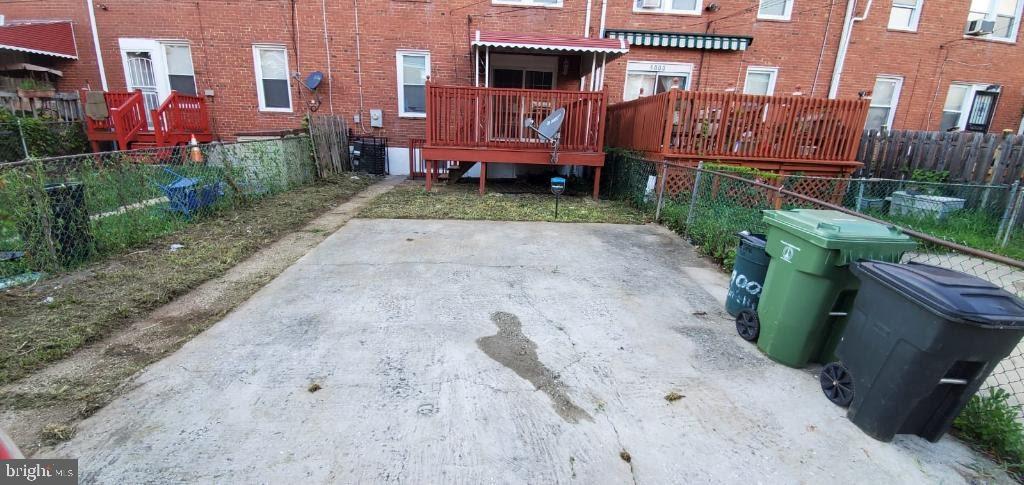 4007 Cedardale Road Baltimore, MD 21215 - Photo 9 of 16 Covered Deck and Parking pad