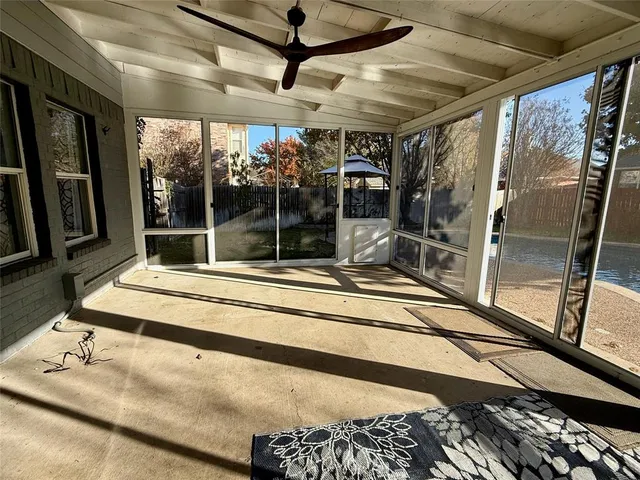 a house with swimming pool in front of it