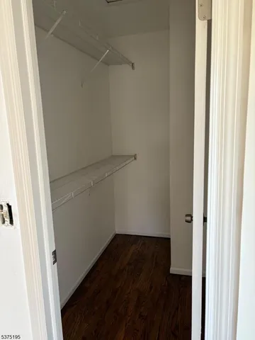 a view of front door with wooden floor