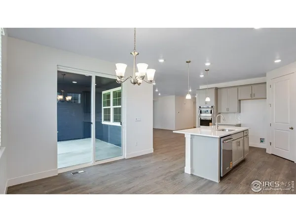 a black and white photo of a big room