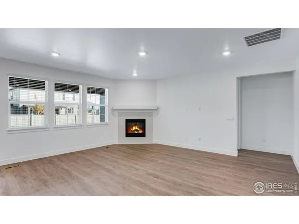 a open hall with a fireplace