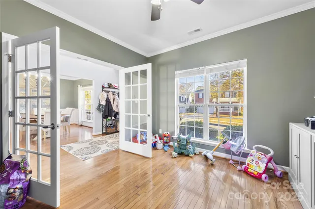 a bedroom with furniture and a window