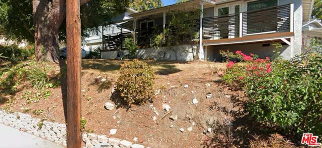 a view of house with a outdoor space
