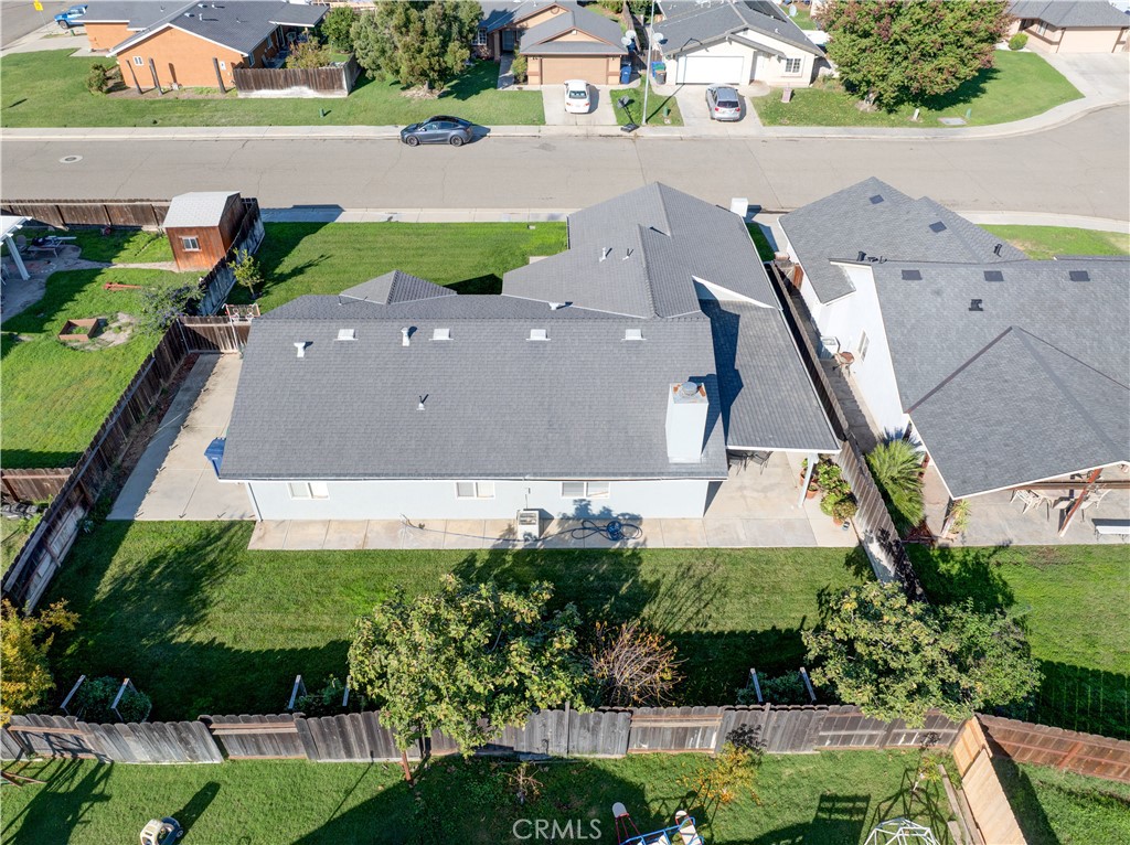2341 Mesquite Court Merced, CA 95348 - Photo 17 of 17 an aerial view of a house with a garden and a yard