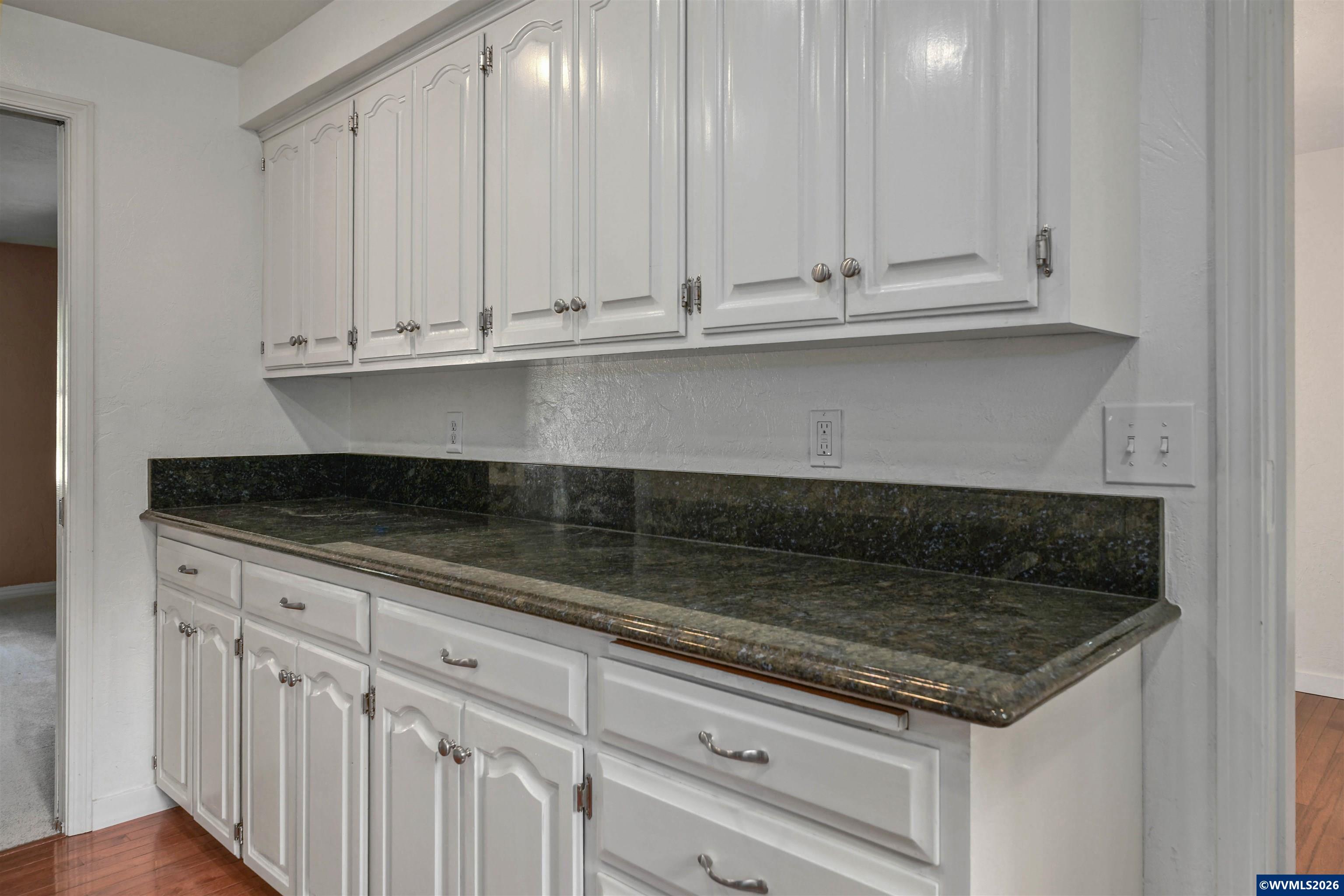 220 Northwest Downy Drive Sublimity, OR 97385 - Photo 8 of 47 a stove top oven sitting inside of a kitchen