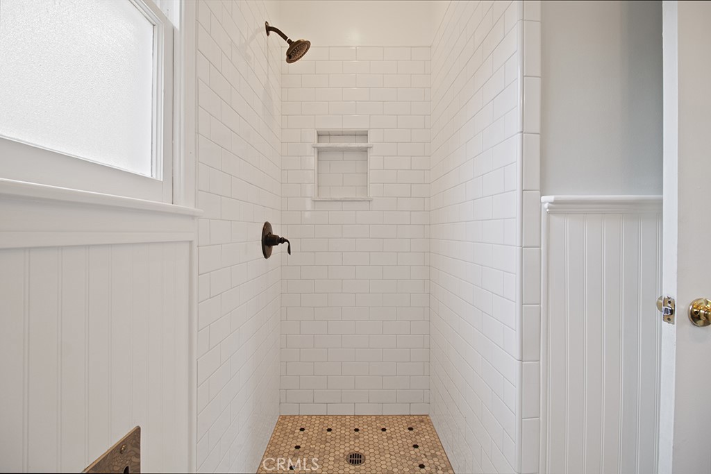 2726 Tapo Street Simi Valley, CA 93063 - Photo 12 of 48 a bathroom with a shower