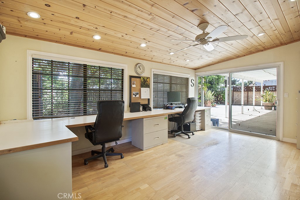 2726 Tapo Street Simi Valley, CA 93063 - Photo 15 of 48 a view of a workspace with furniture and a large window