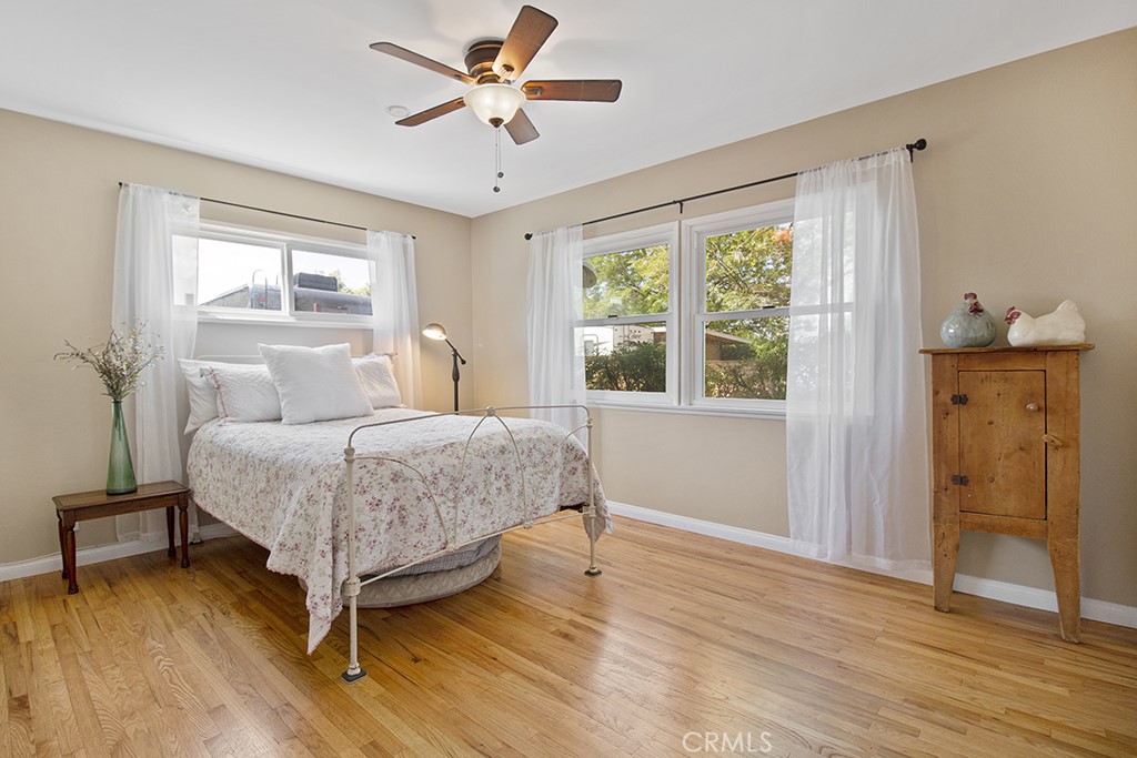 2726 Tapo Street Simi Valley, CA 93063 - Photo 22 of 48 a bedroom with a bed and a window