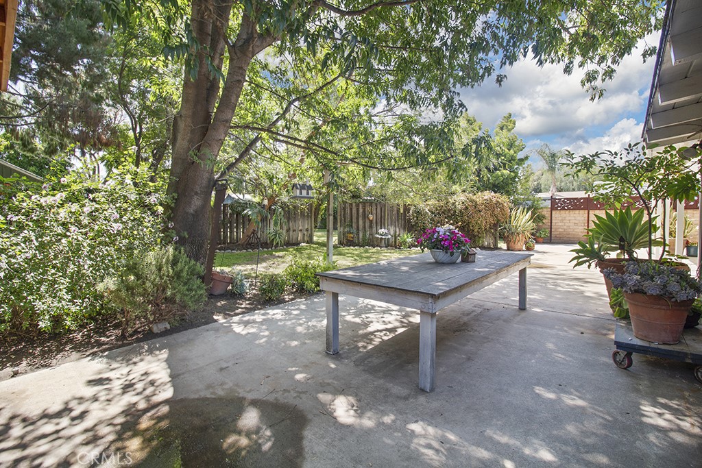 2726 Tapo Street Simi Valley, CA 93063 - Photo 27 of 48 a view of a bench in a backyard