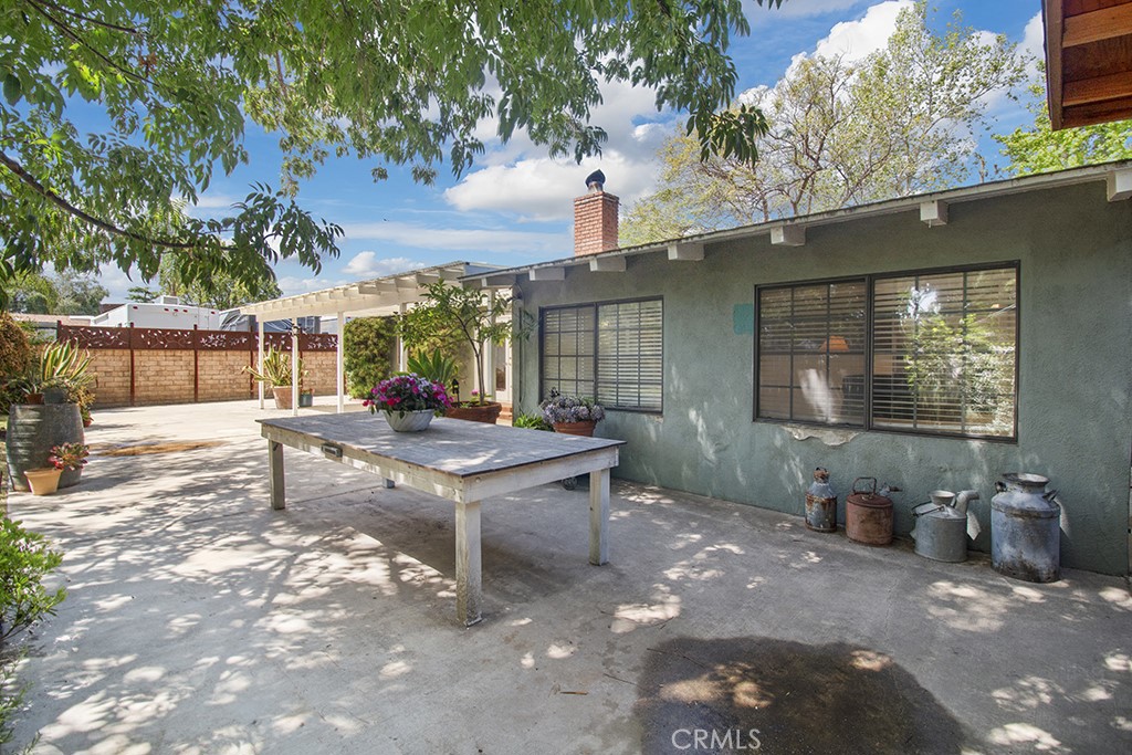 2726 Tapo Street Simi Valley, CA 93063 - Photo 28 of 48 a view of a backyard with sitting area