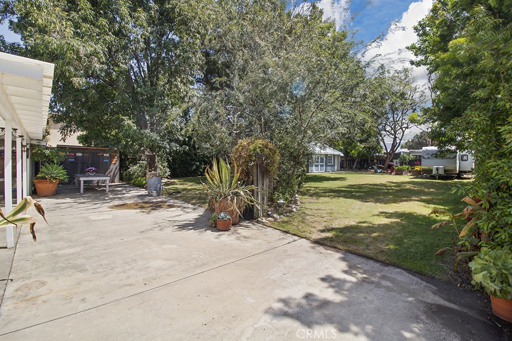 2726 Tapo Street Simi Valley, CA 93063 - Photo 29 of 48 a view of a park with swings and slides