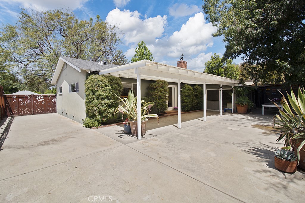 2726 Tapo Street Simi Valley, CA 93063 - Photo 31 of 48 a house view with a garden space