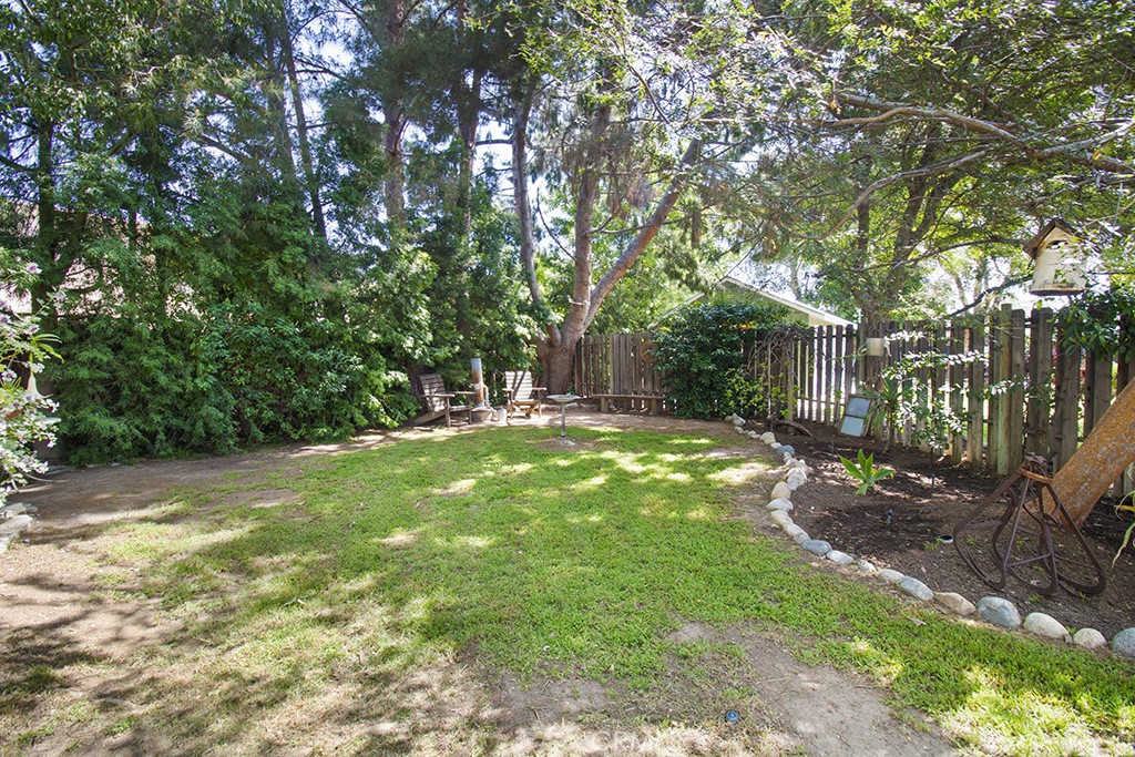 2726 Tapo Street Simi Valley, CA 93063 - Photo 33 of 48 a view of a yard with plants and large trees