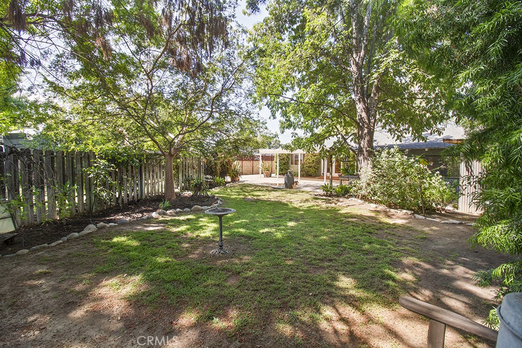 2726 Tapo Street Simi Valley, CA 93063 - Photo 35 of 48 a backyard of a house with lots of green space
