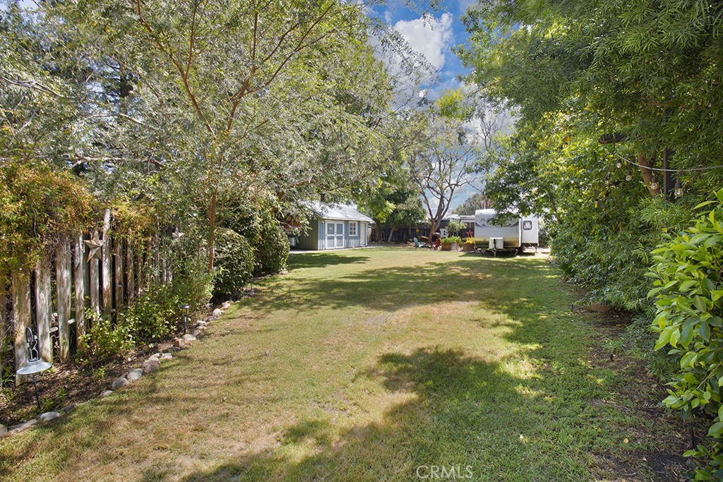 2726 Tapo Street Simi Valley, CA 93063 - Photo 36 of 48 a view of a tree in front of a house