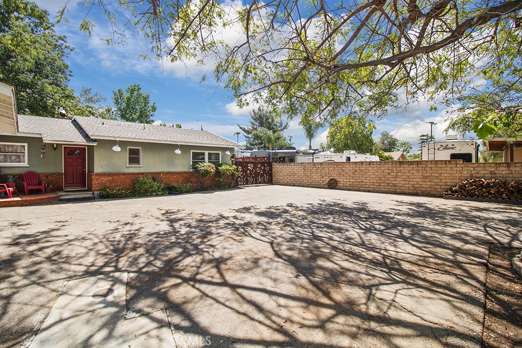 2726 Tapo Street Simi Valley, CA 93063 - Photo 44 of 48 a front view of a house with a yard covered in snow