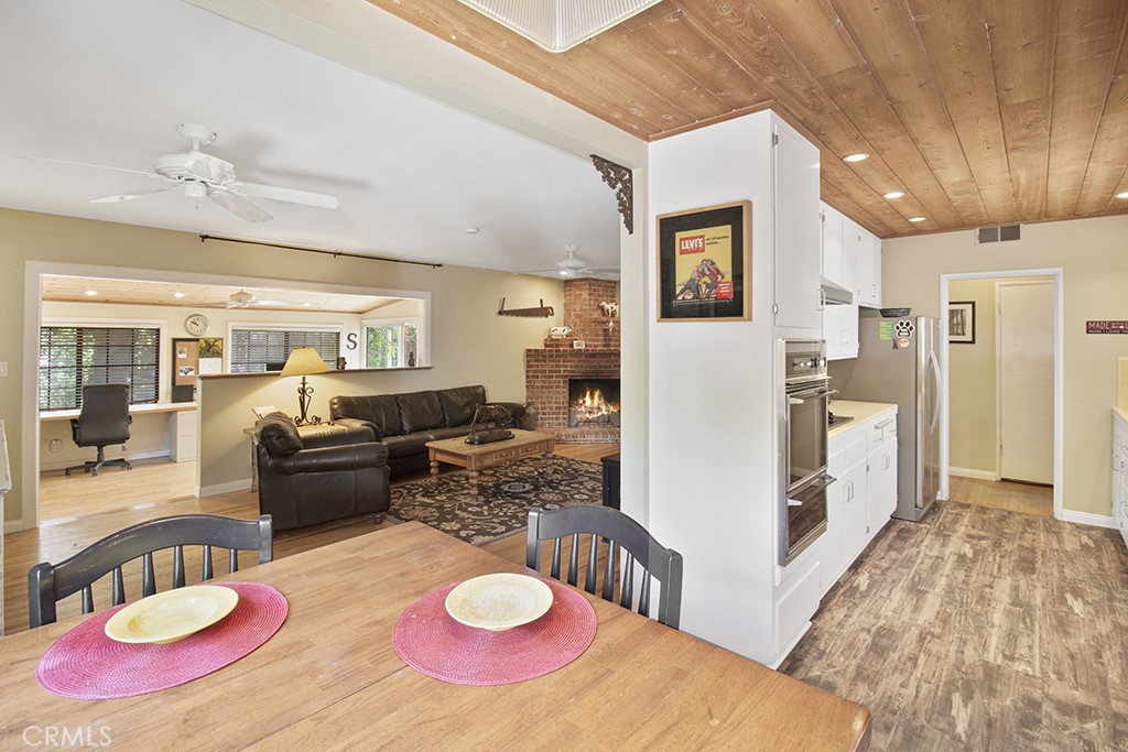 2726 Tapo Street Simi Valley, CA 93063 - Photo 8 of 48 a living room with furniture and a table