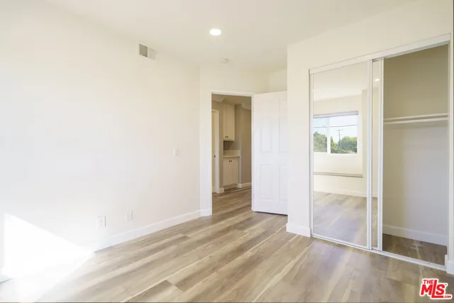 a view of a house with a street