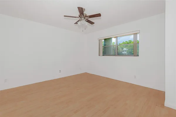 a view of a big room with carpet