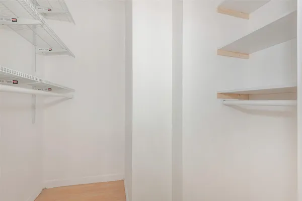 a view of a room with racks on the wall