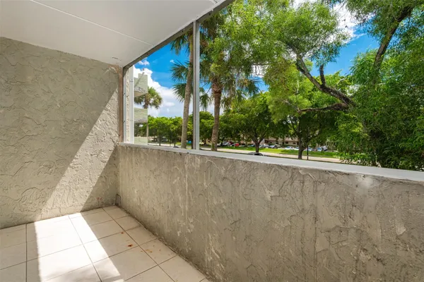 a view of a balcony with an outdoor space