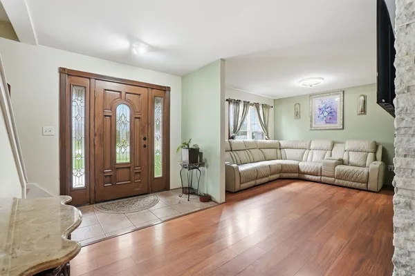 a living room with furniture and a couch