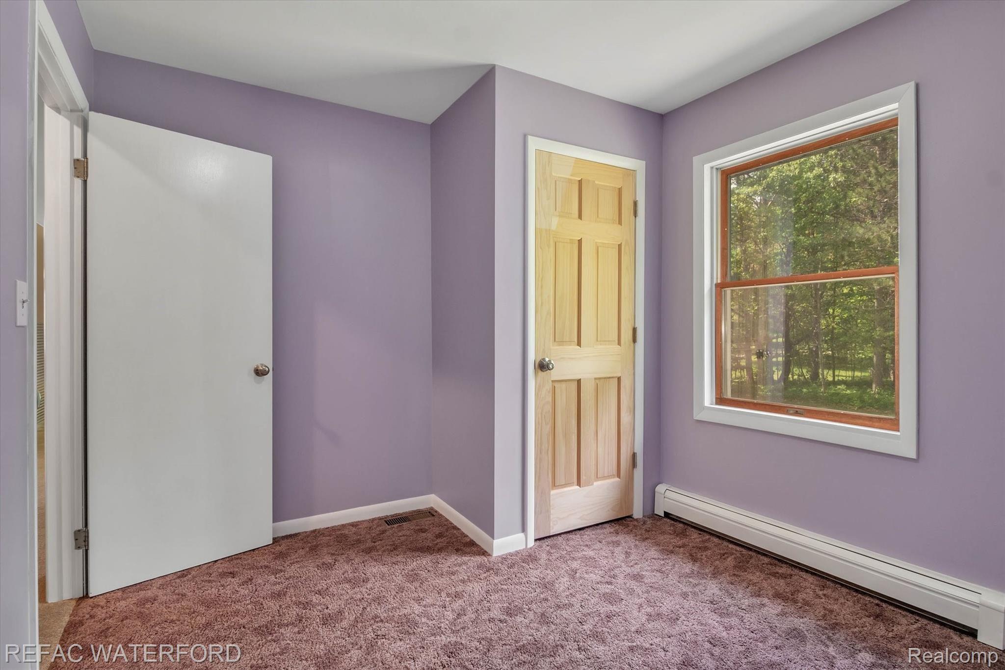 480 Roscommon Road Roscommon, MI 48653 - Photo 25 of 65 Bedroom 3 closet and perfect window placement.