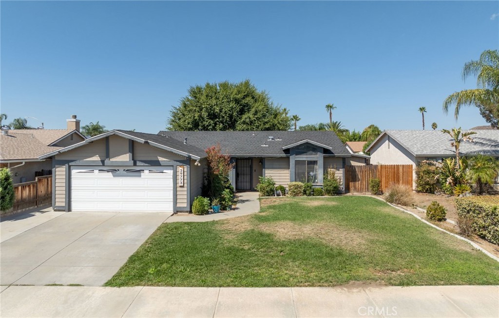 29773 Gifhorn Road Menifee, CA 92584 - Photo 1 of 25 a front view of a house with a yard