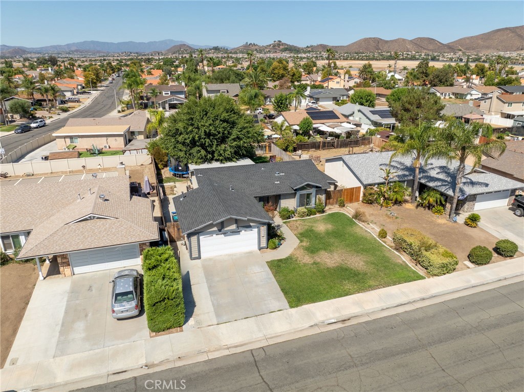 29773 Gifhorn Road Menifee, CA 92584 - Photo 24 of 25 an aerial view of residential houses with outdoor space