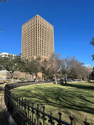 a front view of a building with outdoor space