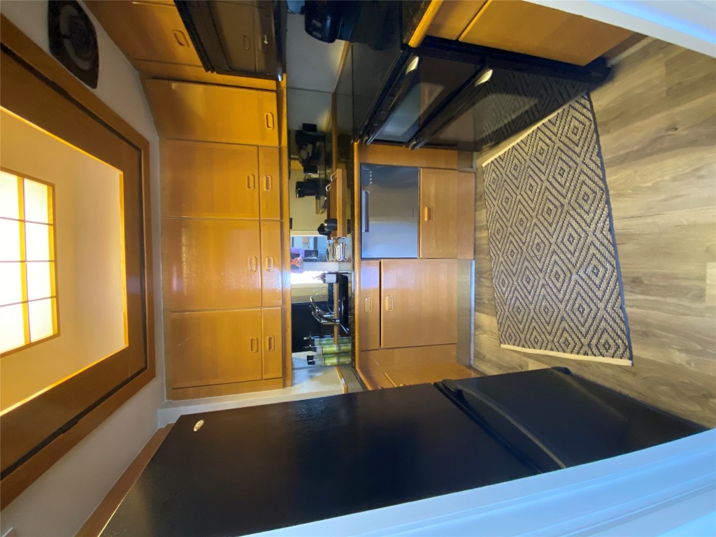 1122 Colorado Street, Unit 1802 Austin, TX 78701 - Photo 8 of 9 a view of a kitchen with a sink and cabinets