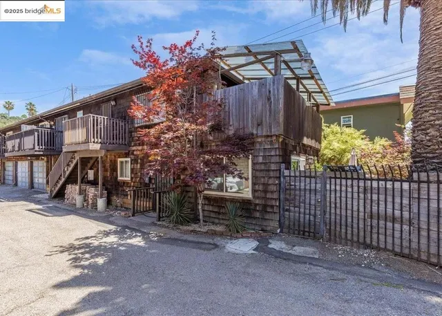 a view of a house with a street